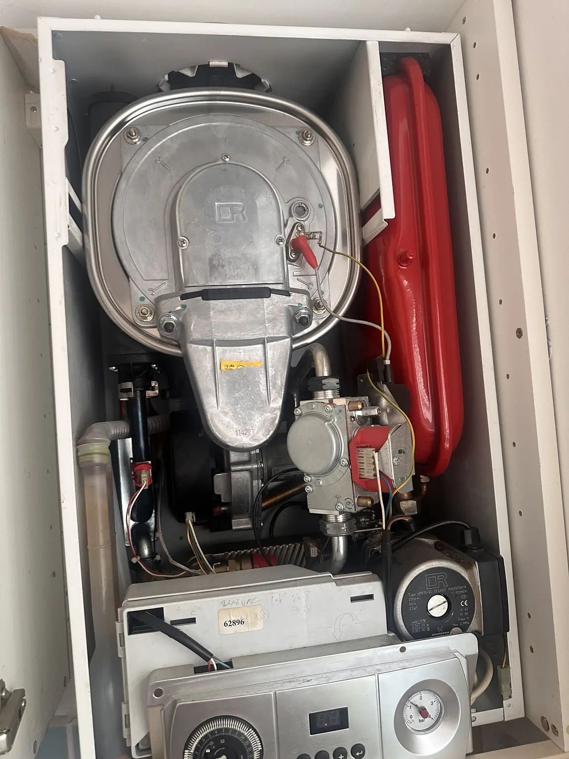 Internal boiler repair by a heating engineer serving Bourne End
