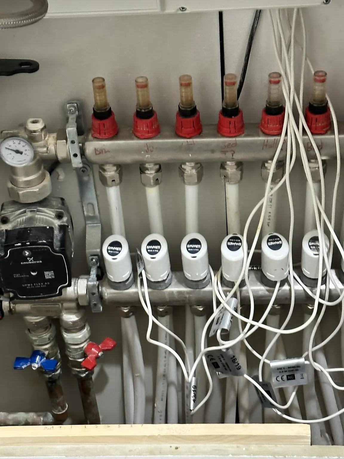 Underfloor heating manifold and pipework in Burnham
